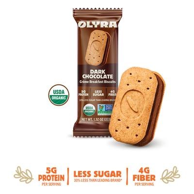 Olyra Dark Chocolate Creme Breakfast Biscuits packaging with a single biscuit on a background with details