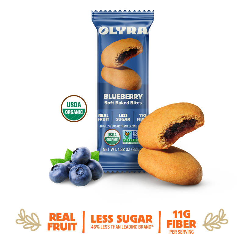 Olyra Blueberry Soft Baked Bites packaging with cookies and blueberries on a white background