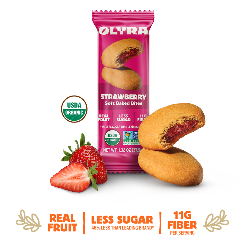 Olyra Strawberry Soft Baked Bites packaging with cookies and strawberries on a white background