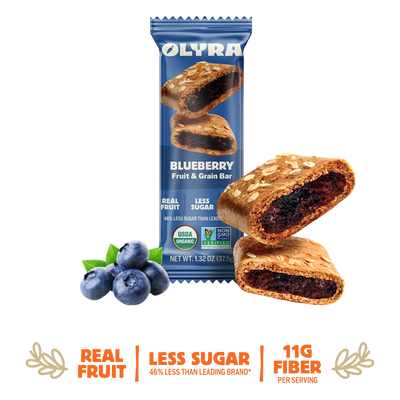 Olyra blueberry fruit and grain bar packaging with blueberries on a white background