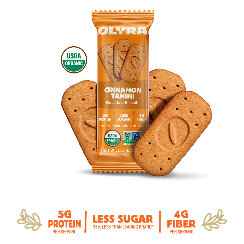 Olyra Cinnamon Tahini breakfast biscuits packaging with cookies on a white background