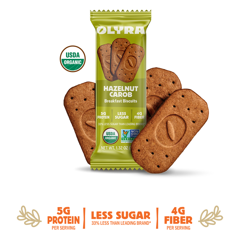 Olyra Hazelnut Carob Breakfast Biscuits packaging with cookies on a white background