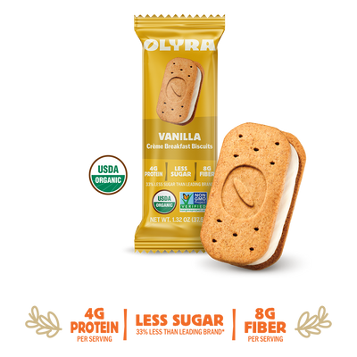 Olyra Vanilla Creme Breakfast Biscuits packaging with a single biscuit sandwich on a background with details