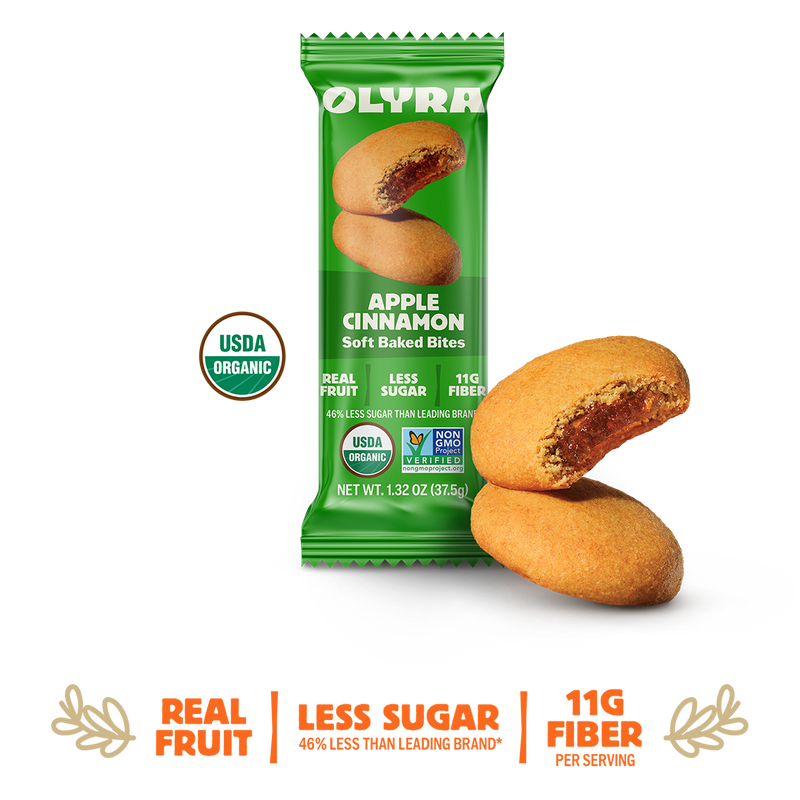 Green package of Olyra Apple Cinnamon soft baked bites on a white background
